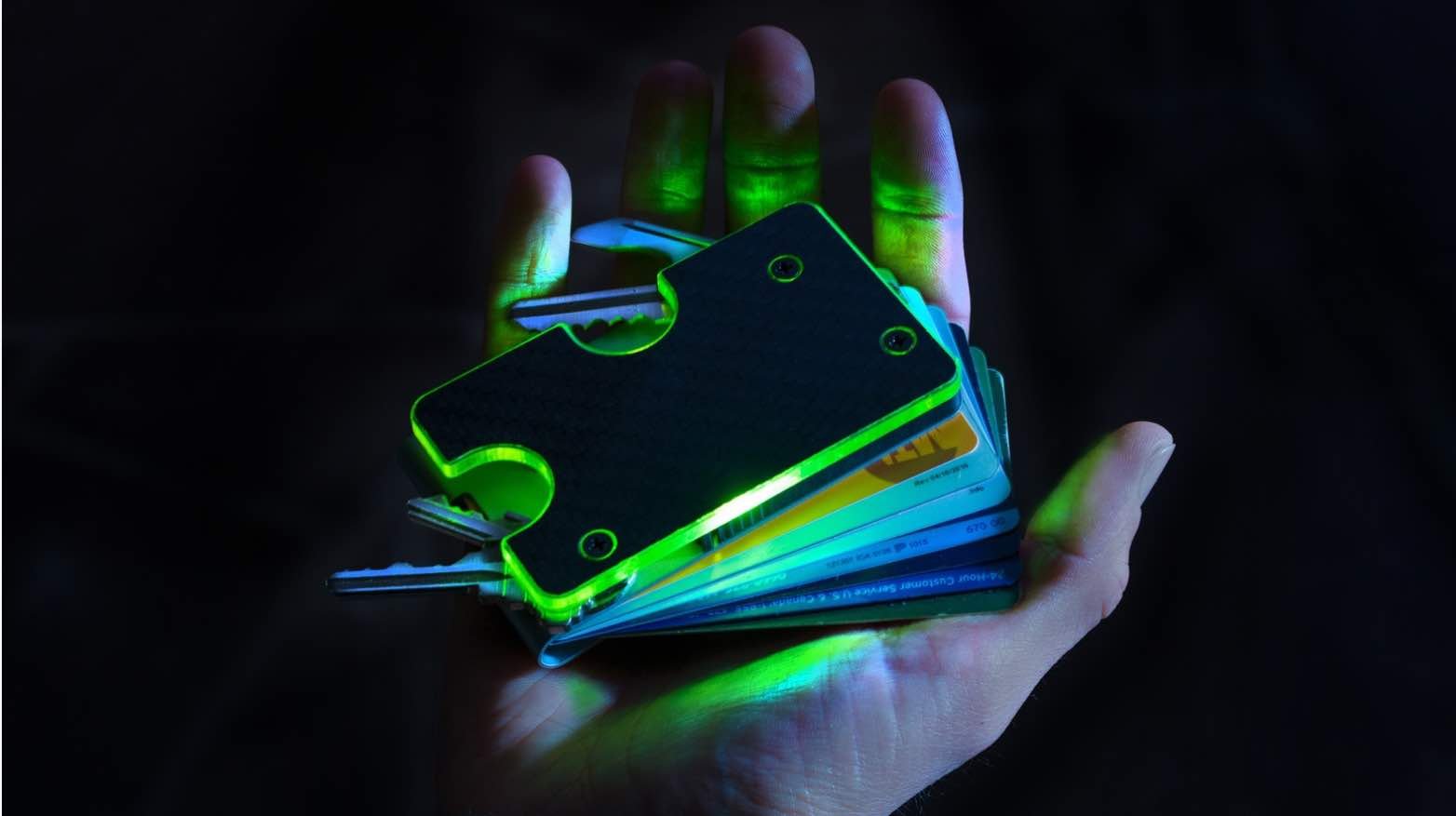 man holding a product on his hand man holding a product on his hand