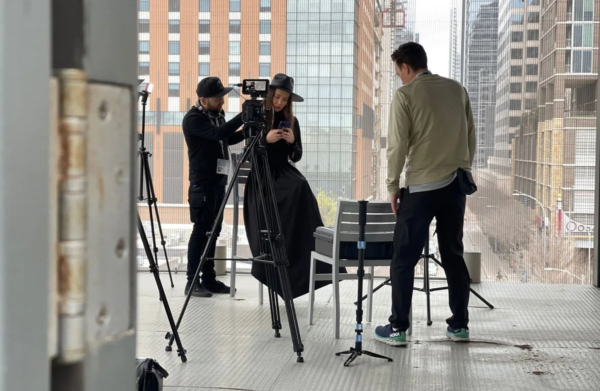 video shoot with people preparing equipment video shoot with people preparing equipment